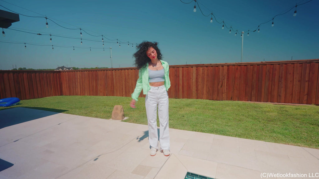 Carla Swims in White Jeans, Top and Shirt