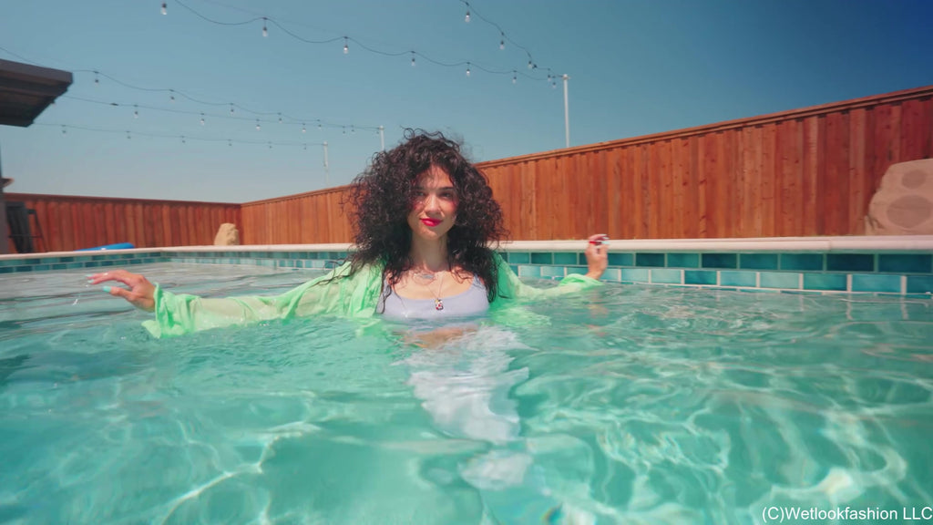 Carla Swims in White Jeans, Top and Shirt