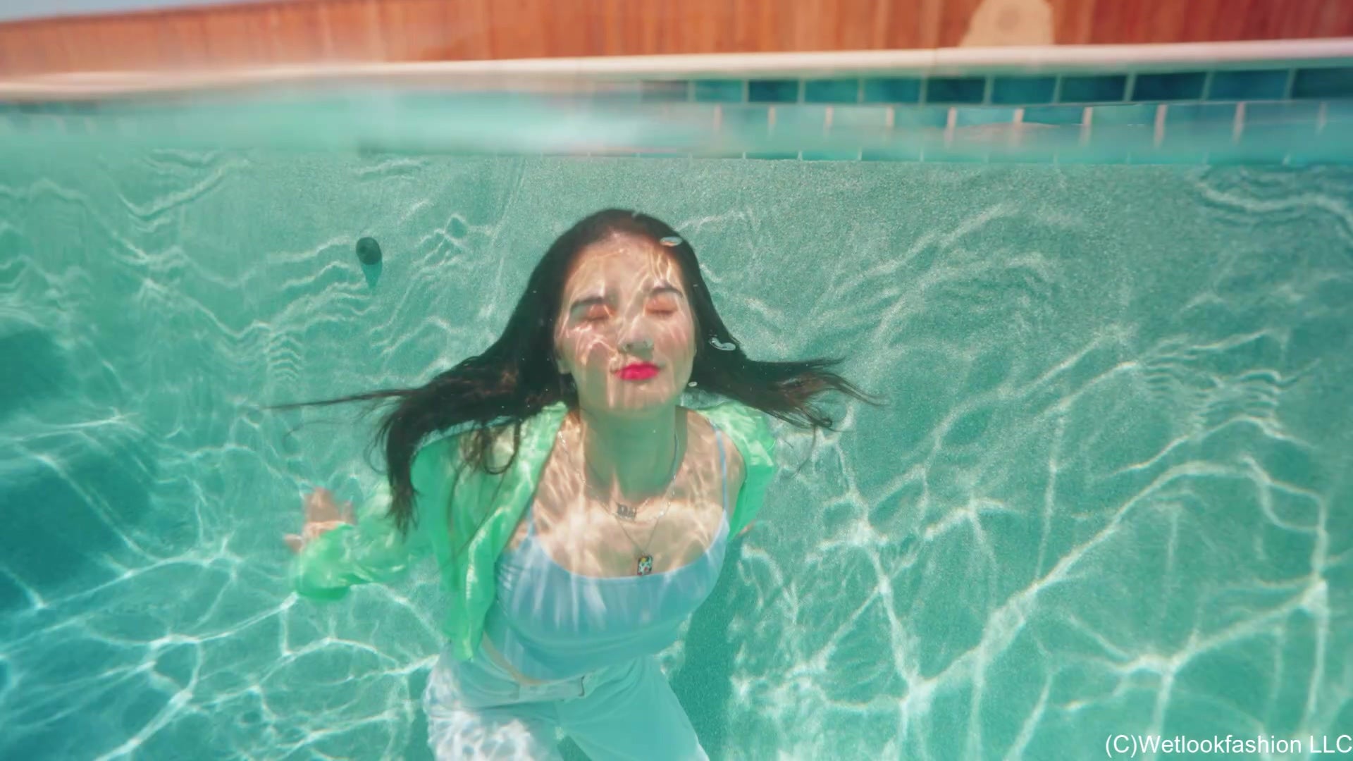 Carla Swims in White Jeans, Top and Shirt
