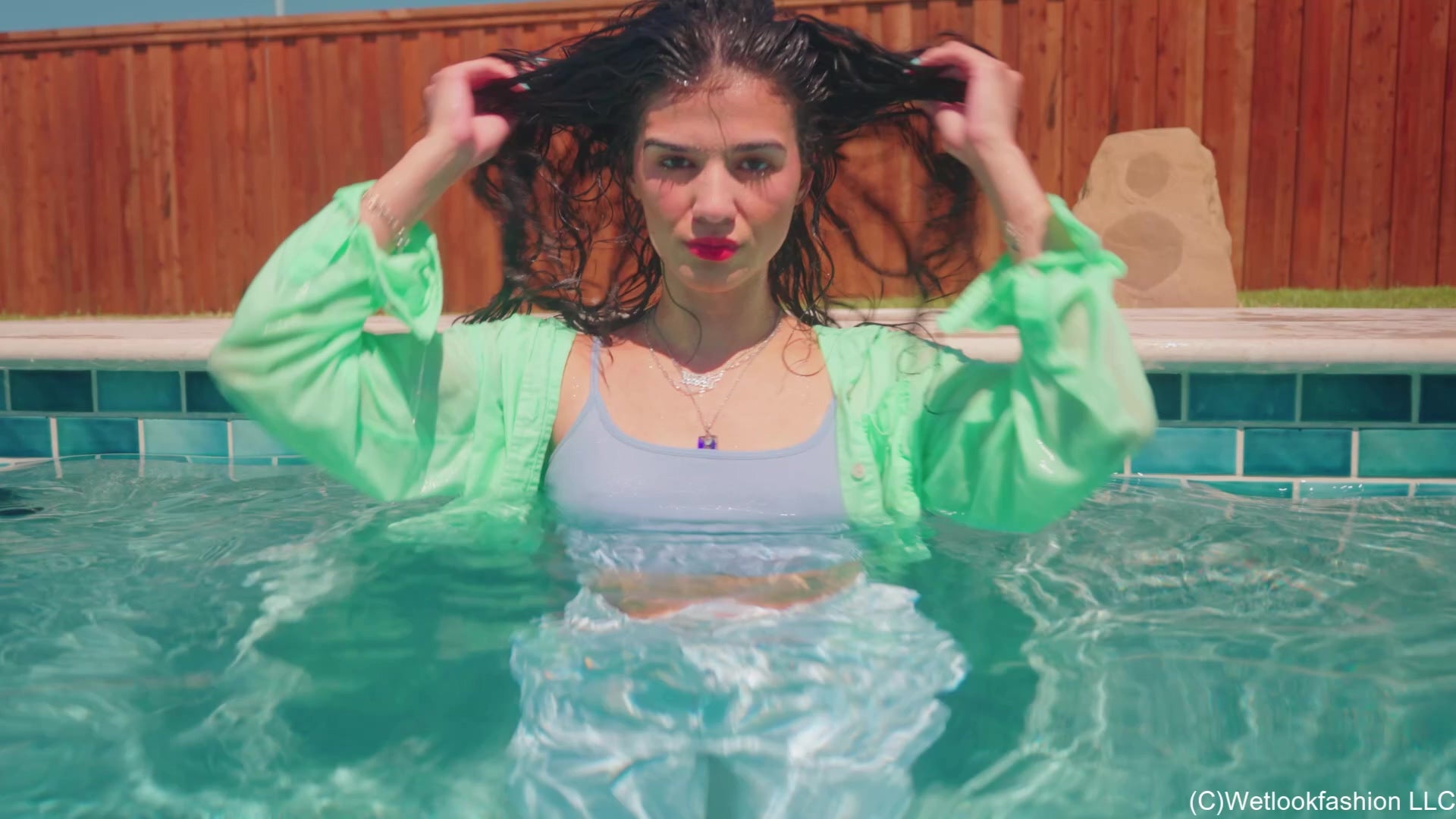 Carla Swims in White Jeans, Top and Shirt