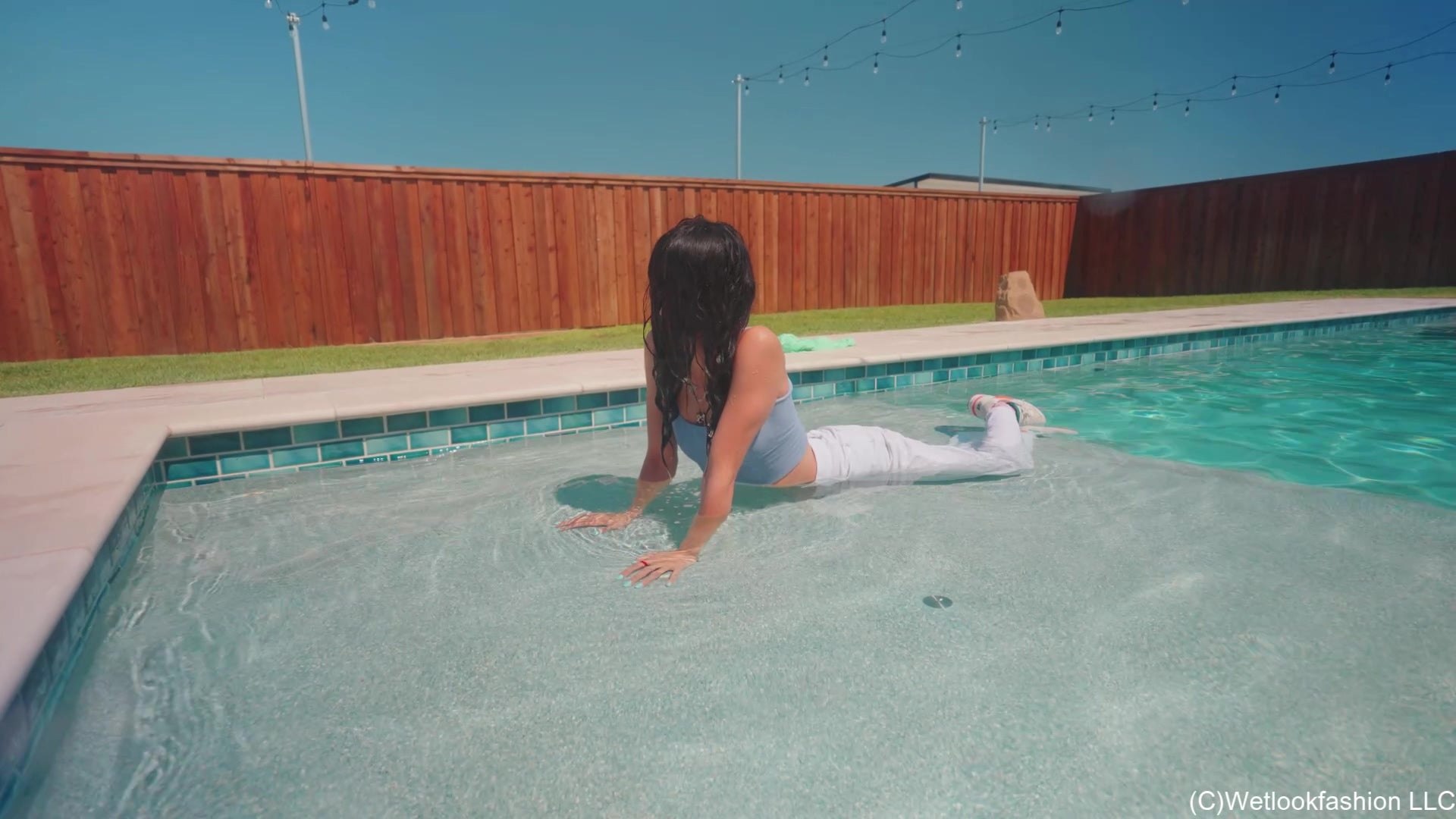 Carla Swims in White Jeans, Top and Shirt