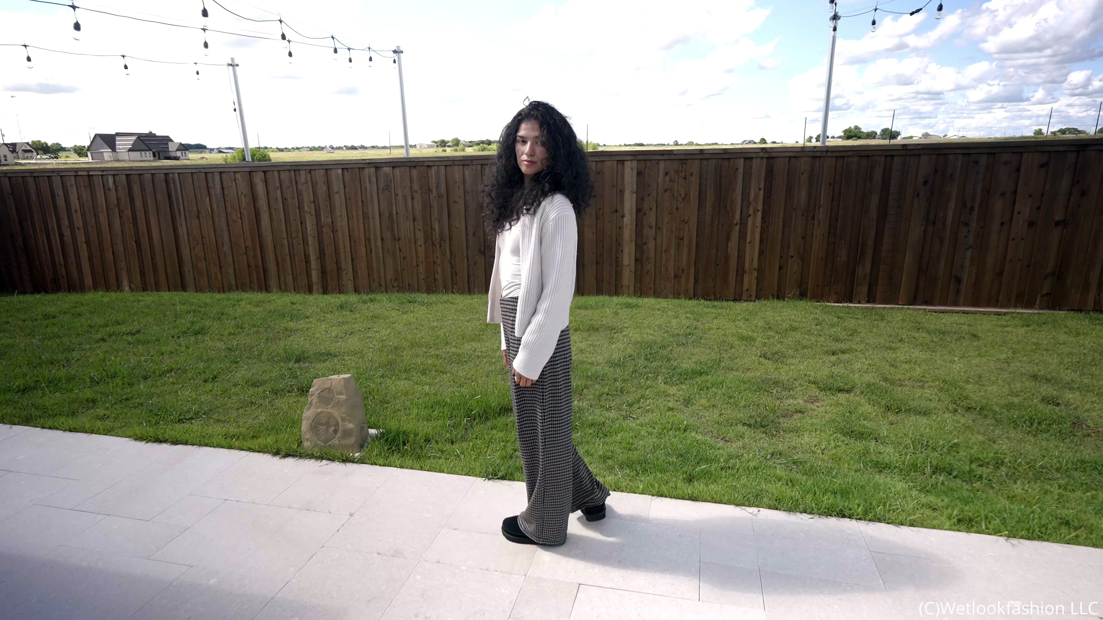 Carla Takes a Dip in the Pool Wearing a Casual Outfit