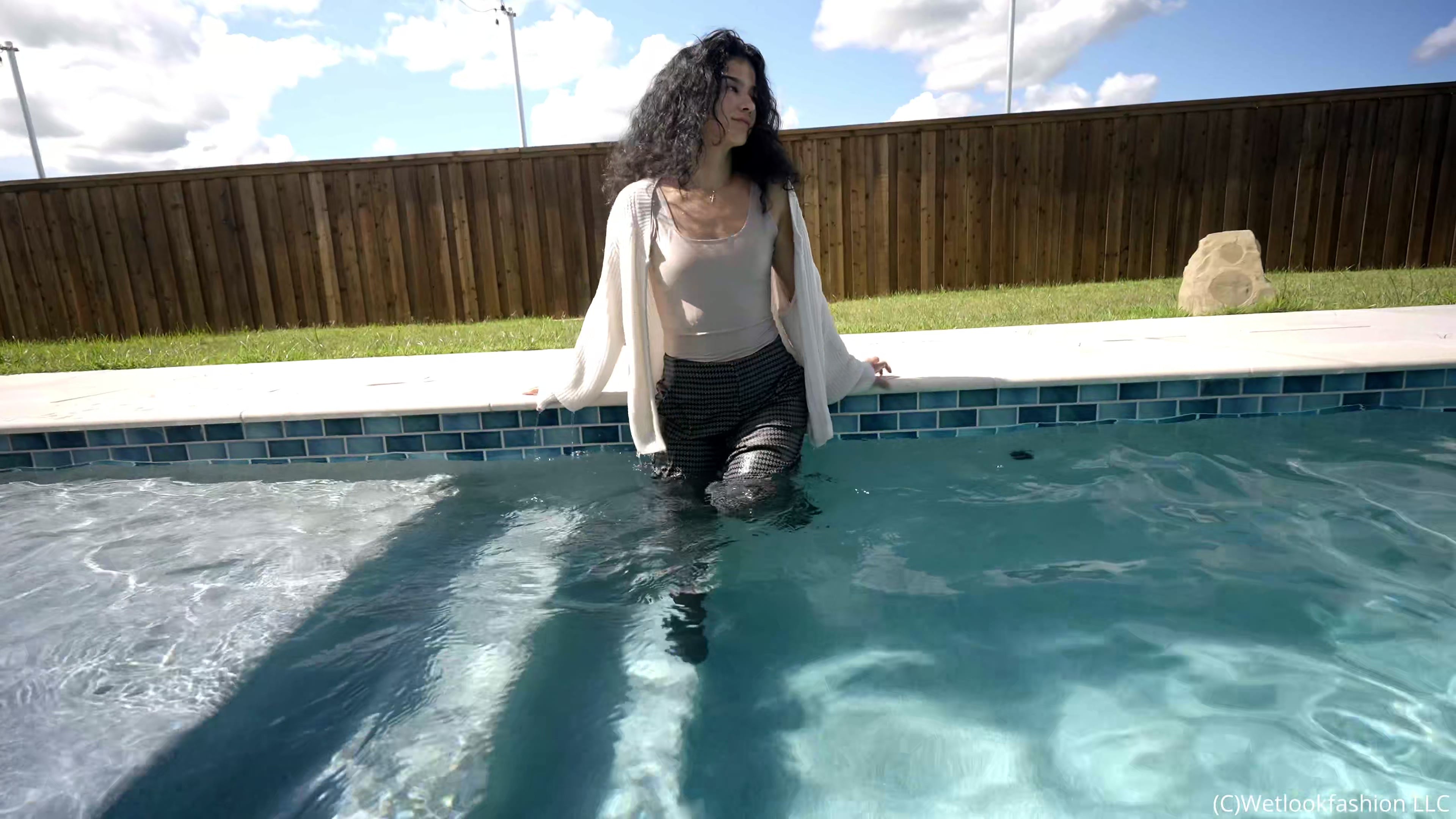 Carla Takes a Dip in the Pool Wearing a Casual Outfit
