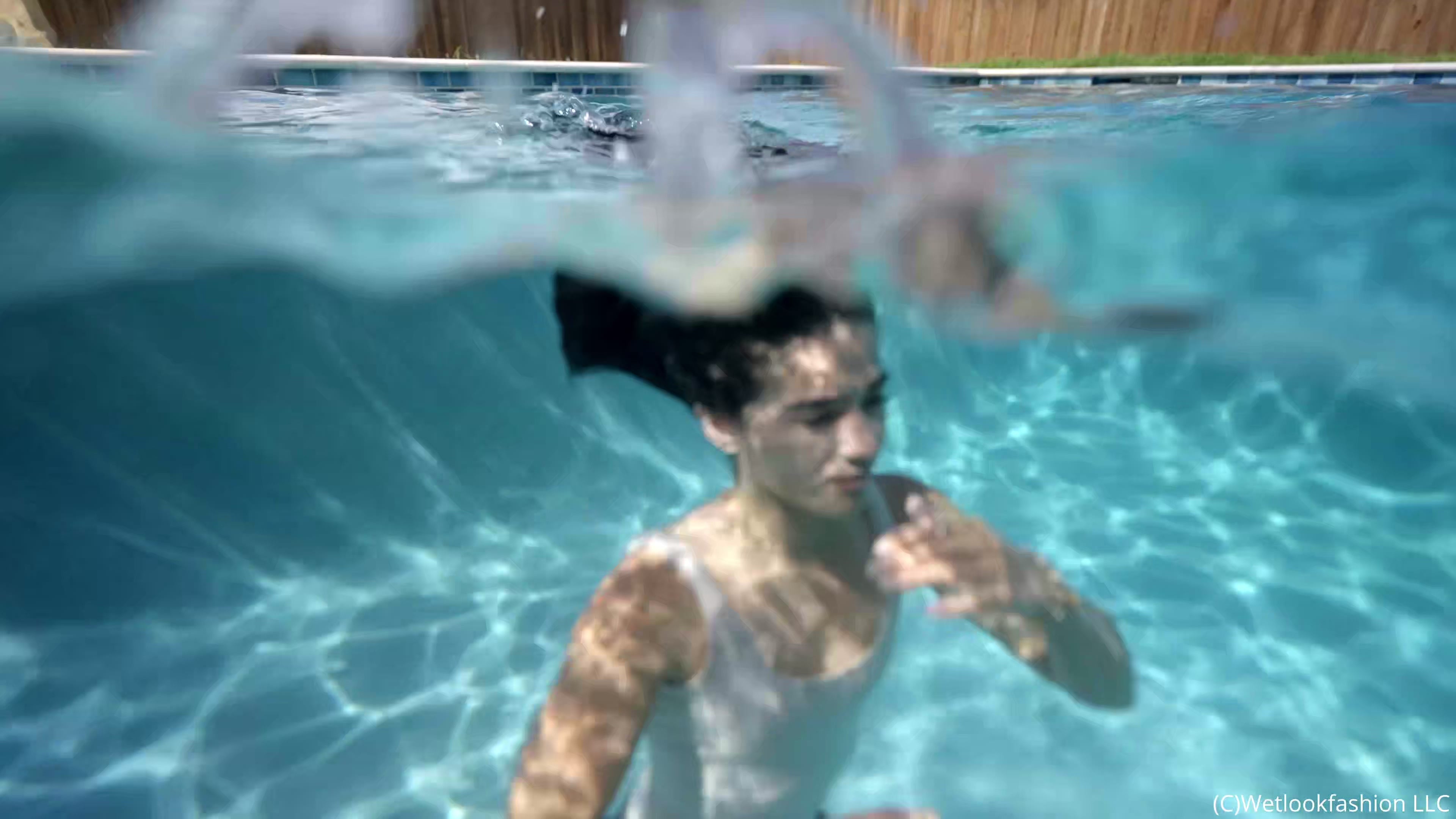 Carla Takes a Dip in the Pool Wearing a Casual Outfit