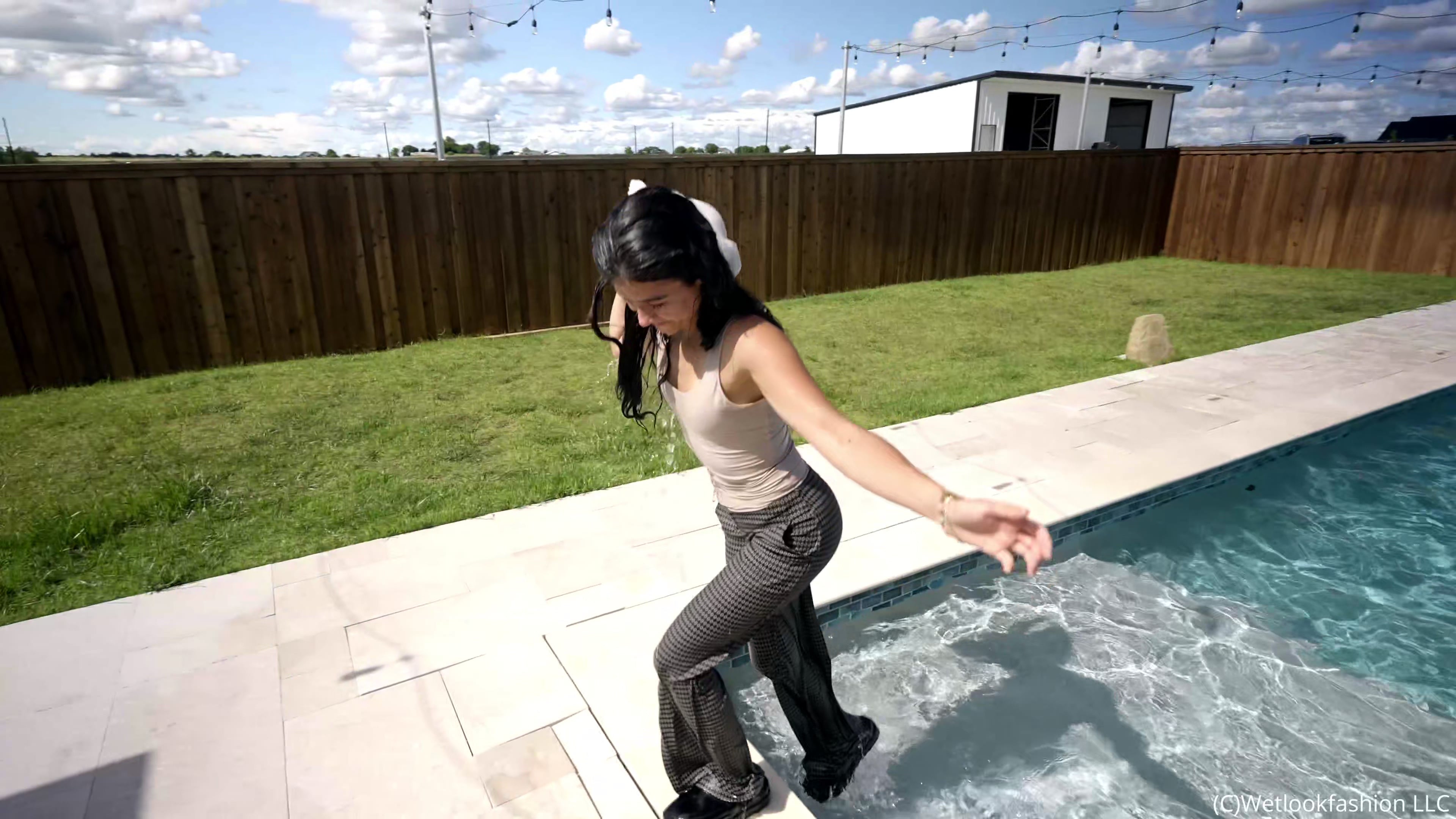 Carla Takes a Dip in the Pool Wearing a Casual Outfit