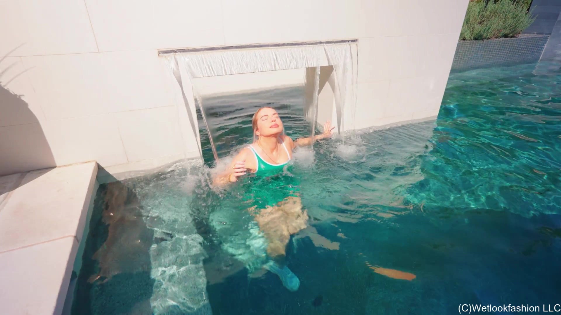 Casey Gets Wet in a Green Mini Dress