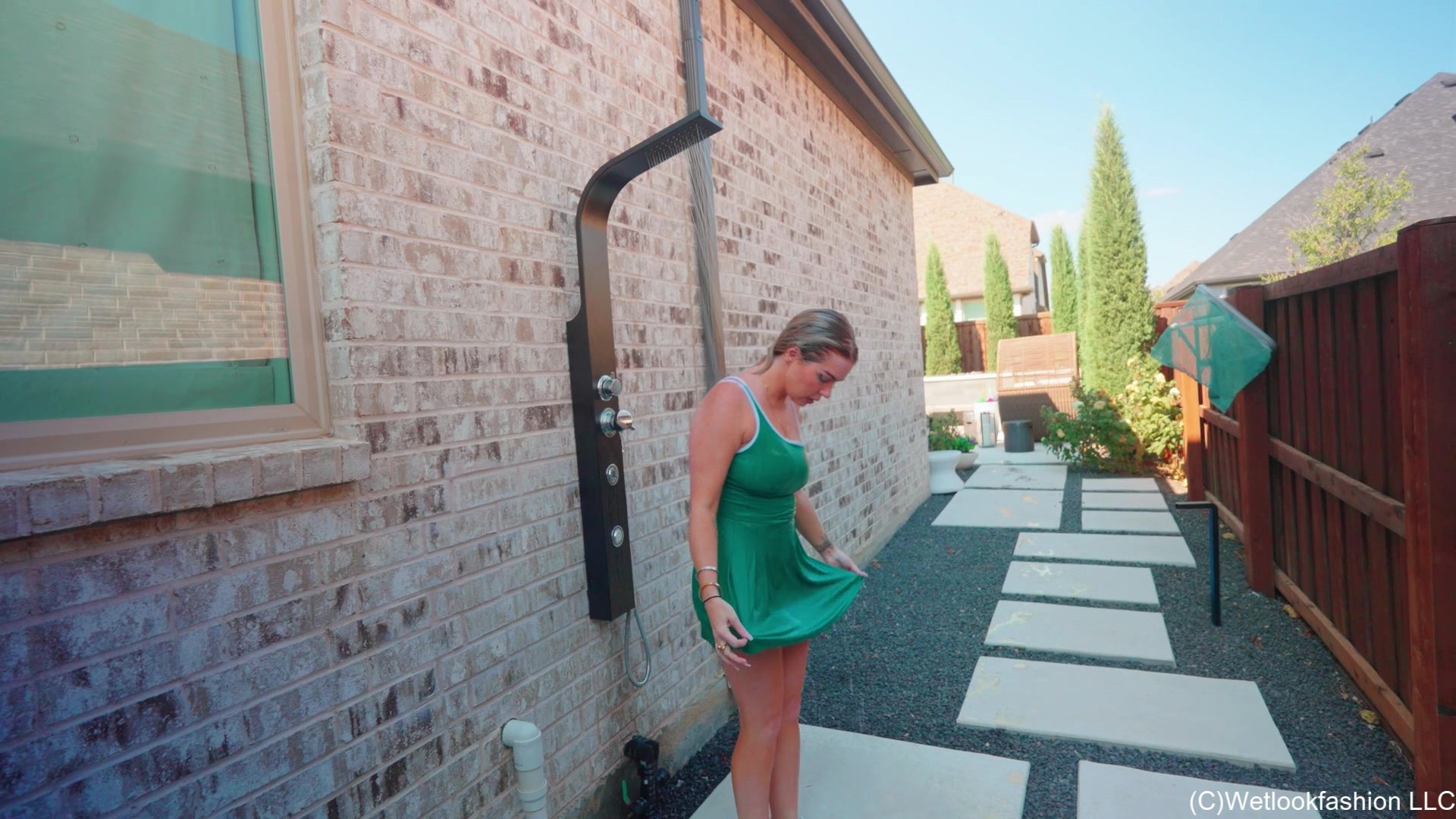 Casey Gets Wet in a Green Mini Dress