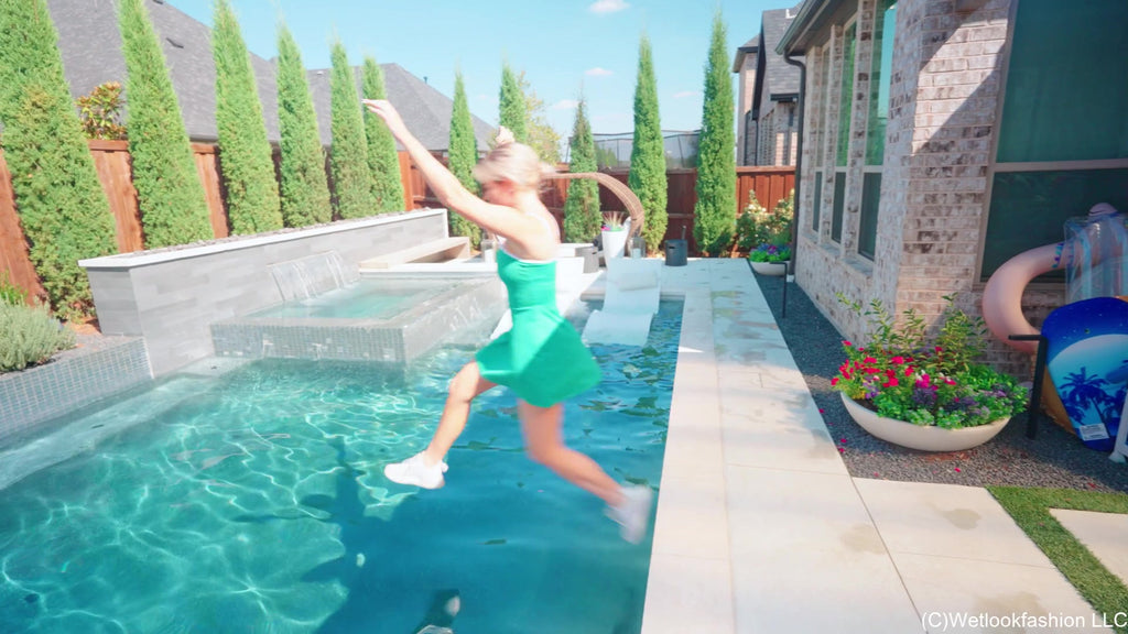 Casey Gets Wet in a Green Mini Dress
