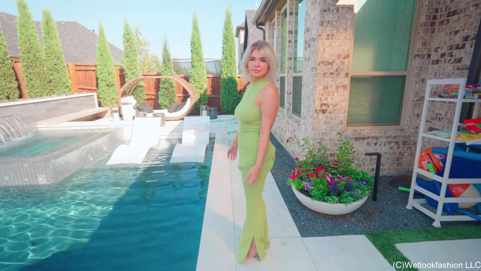 Casey Jumps in the Pool in a Green Pant Outfit