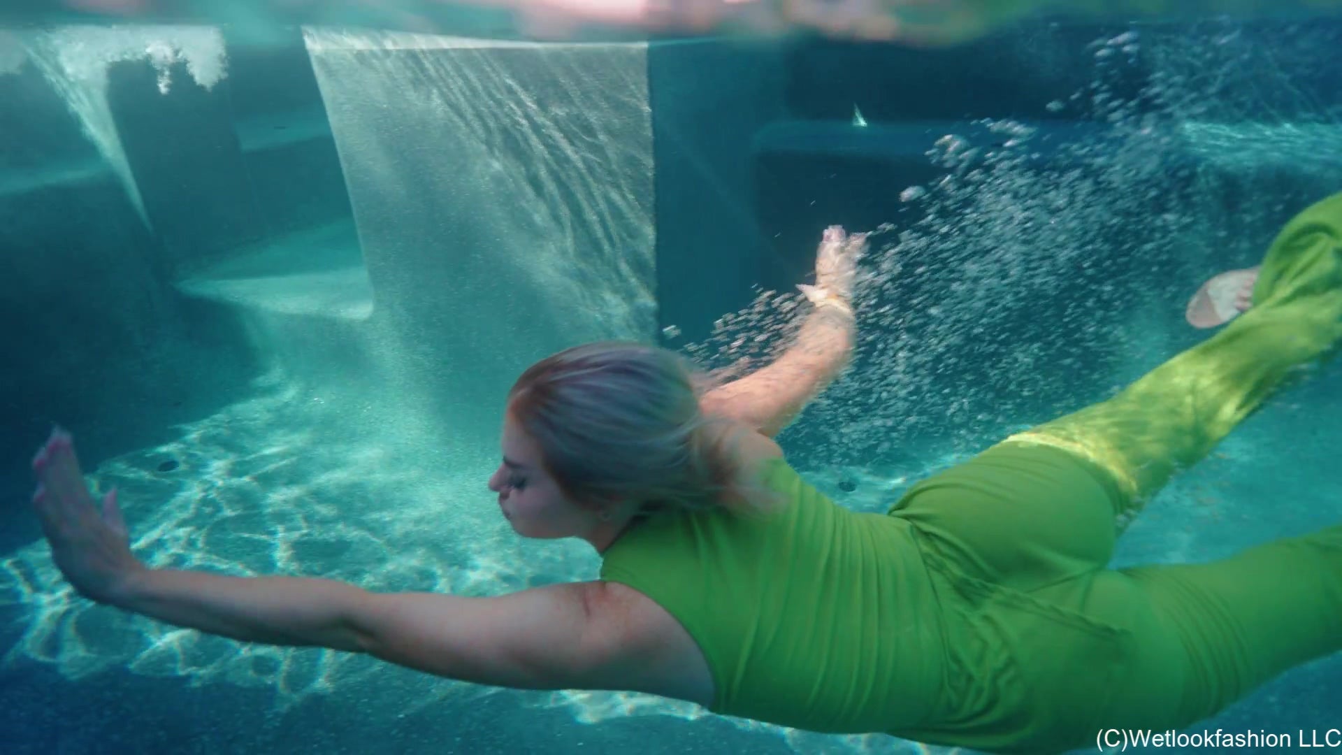 Casey Jumps in the Pool in a Green Pant Outfit