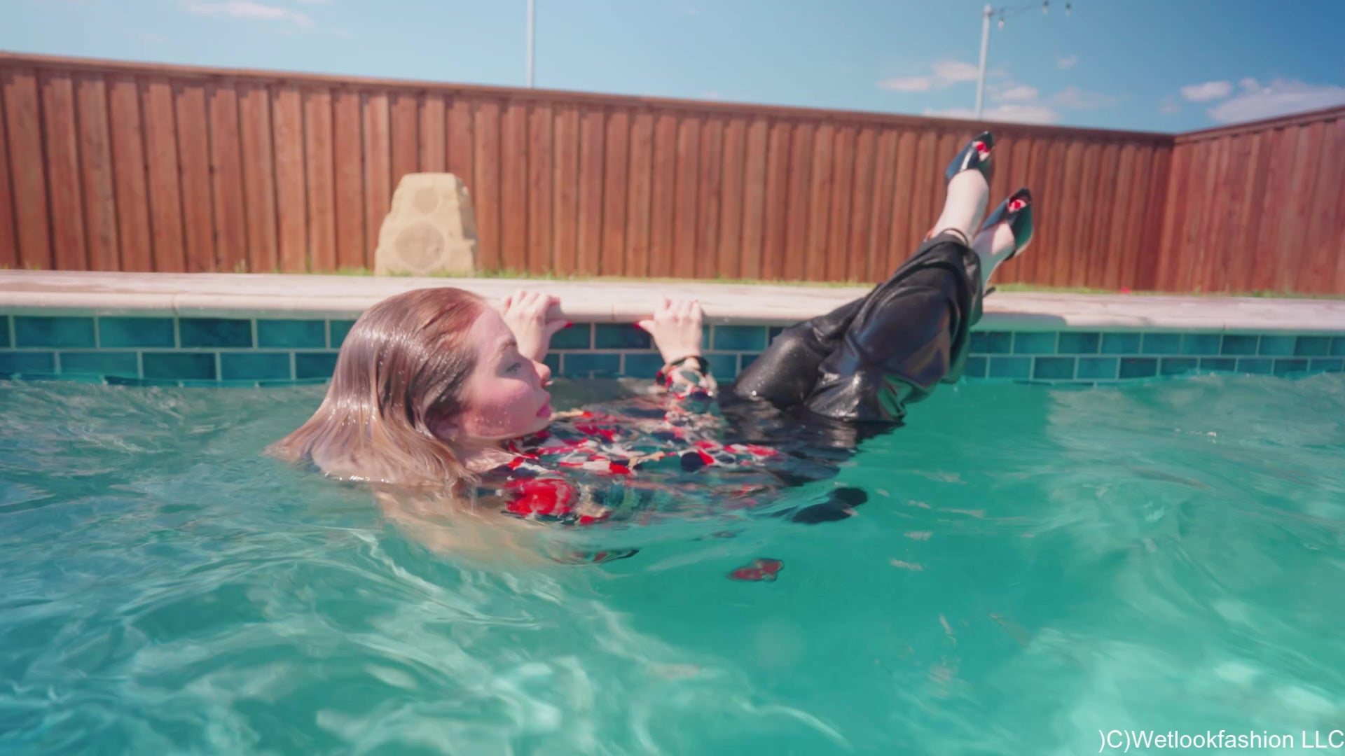 Casey Takes a Pool Dip in a Business Outfit