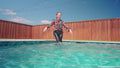 Casey Takes a Pool Dip in a Business Outfit