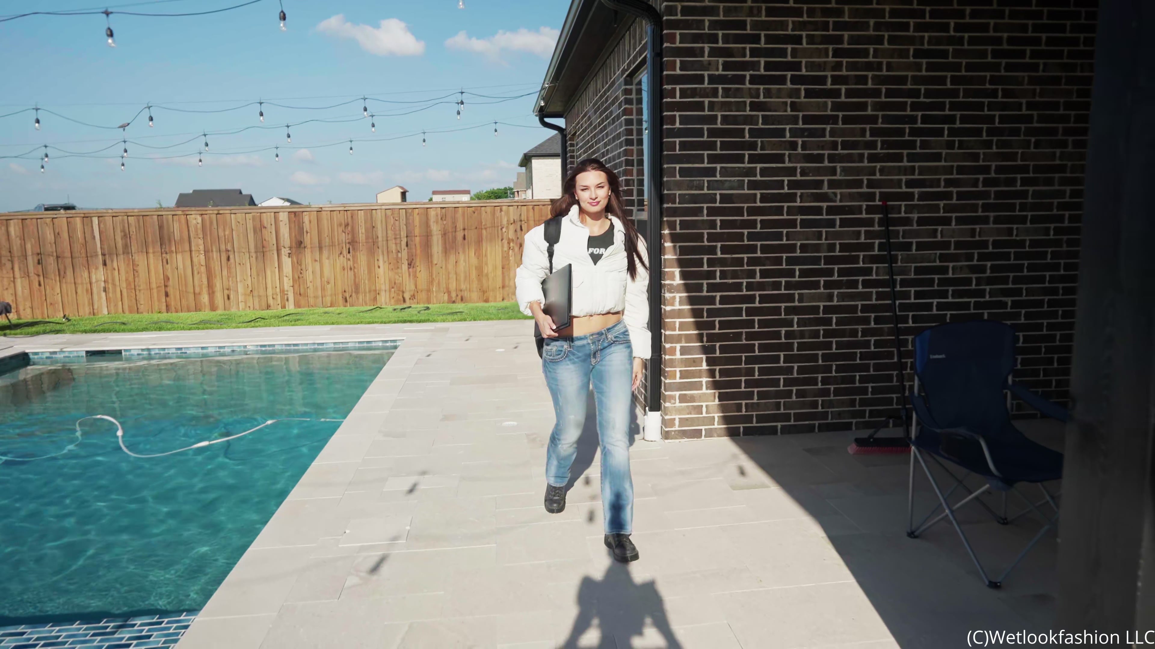 Danielle Goes for a Swim after Work Wearing Jeans