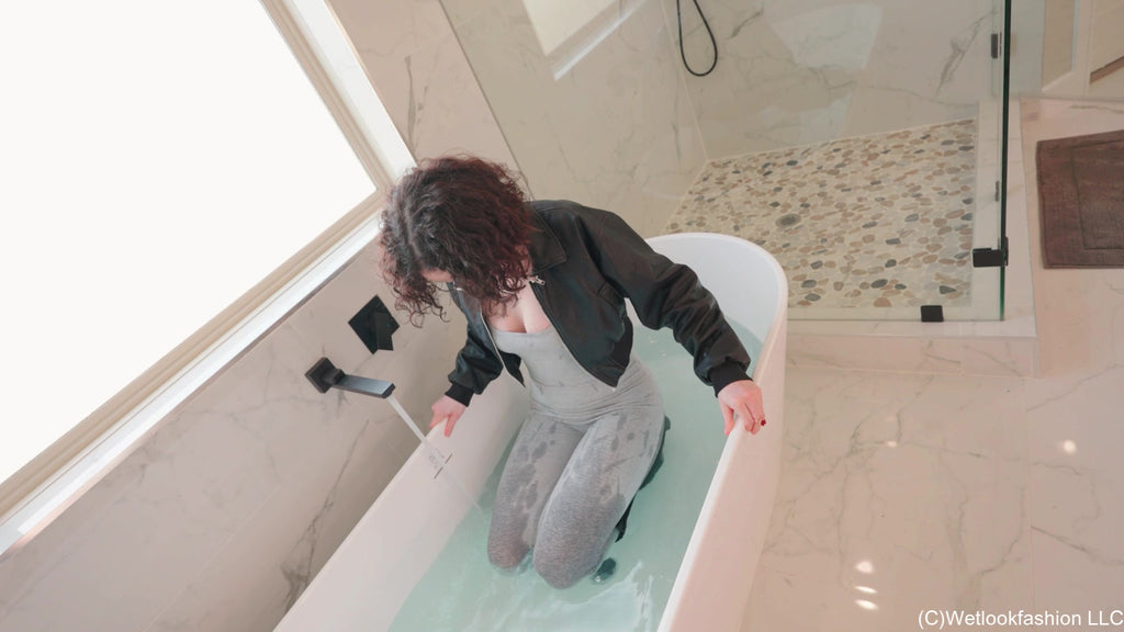 Elena Takes a Bath in a Jumpsuit, Boots and Leather Jacket