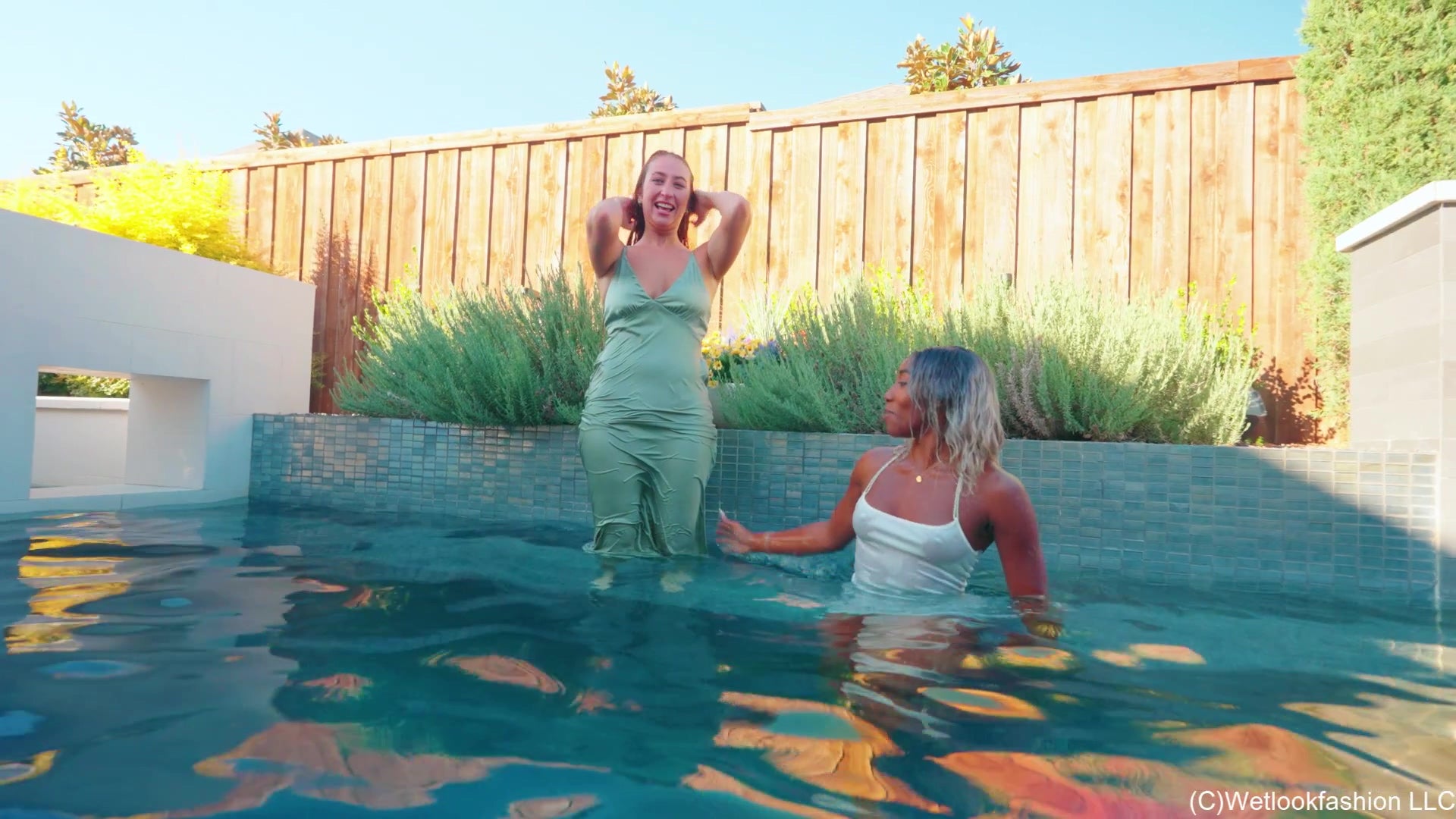 Emma and Naomi Take a Splash in Satin Dresses and Heels