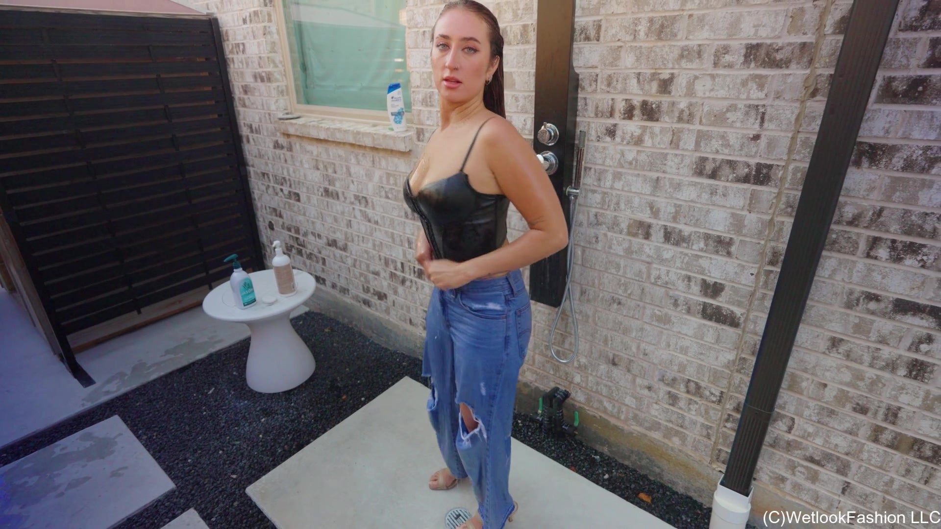 Emma Swims in Jeans and a Leather Top