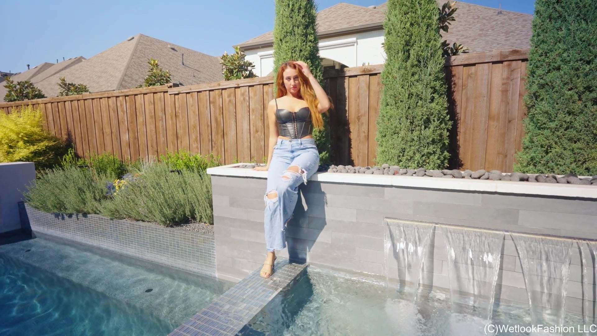 Emma Swims in Jeans and a Leather Top