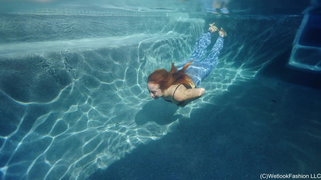 Emma Swims in Jeans and a Leather Top