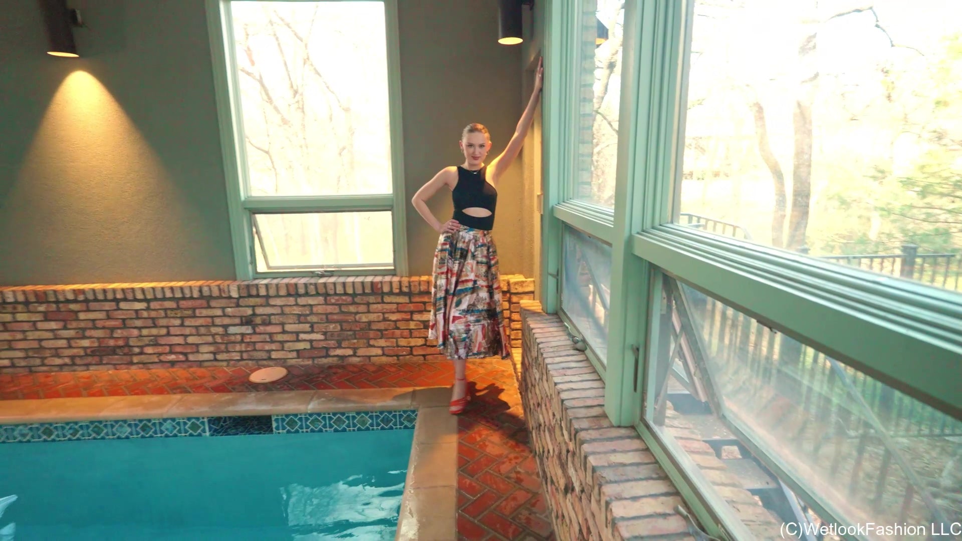 Gigi Is Swimming in a Bodysuit and a Long Satin Skirt