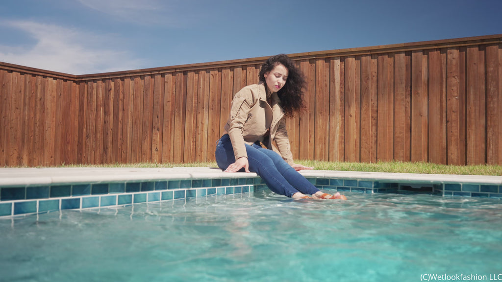 Gina Goes for a Swim in Jeans, Crop Top and a Leather Jacket