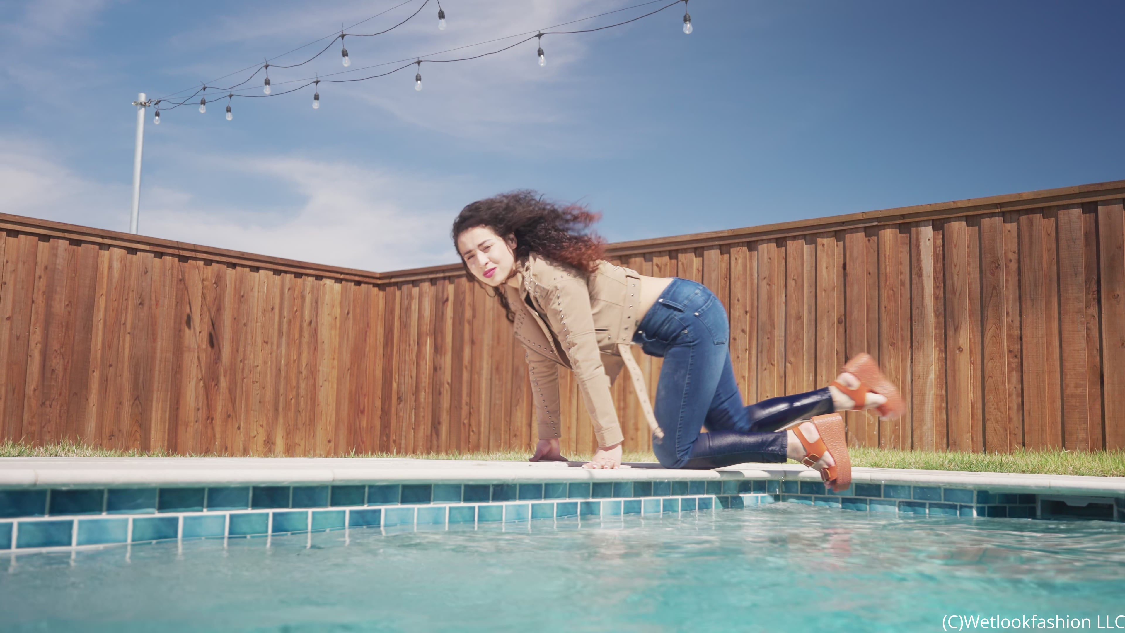 Gina Goes for a Swim in Jeans, Crop Top and a Leather Jacket