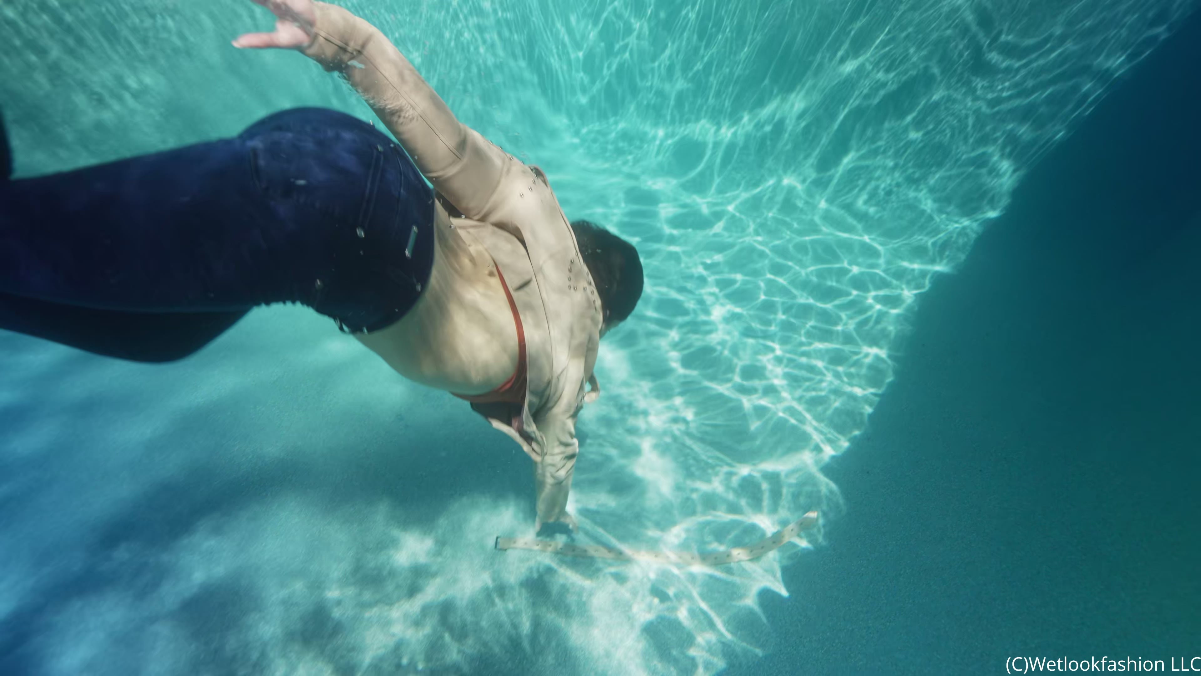 Gina Goes for a Swim in Jeans, Crop Top and a Leather Jacket