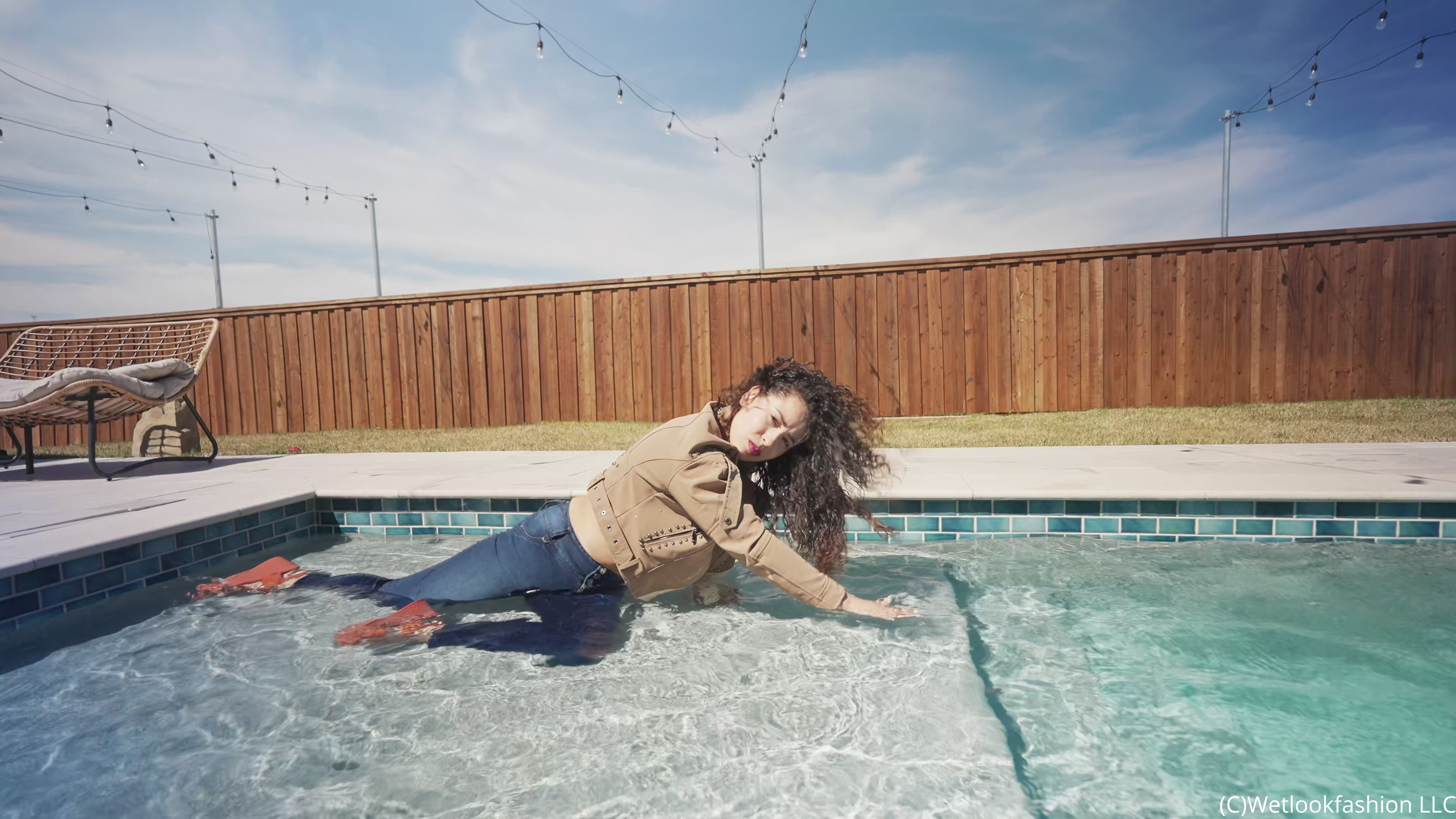 Gina Goes for a Swim in Jeans, Crop Top and a Leather Jacket