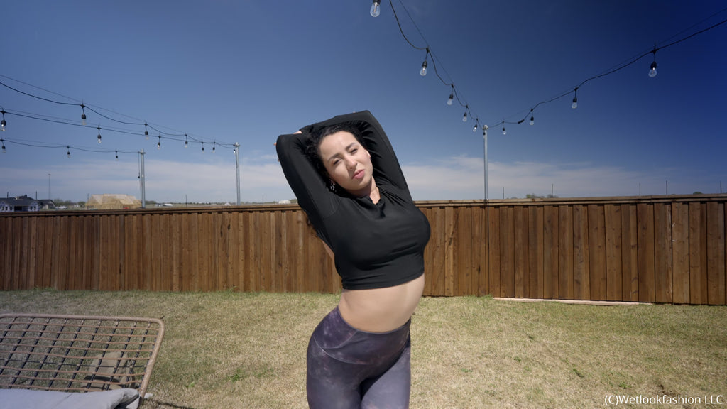 Gina Goes for a Swim in Leggings, a Shiny Top and Sneakers
