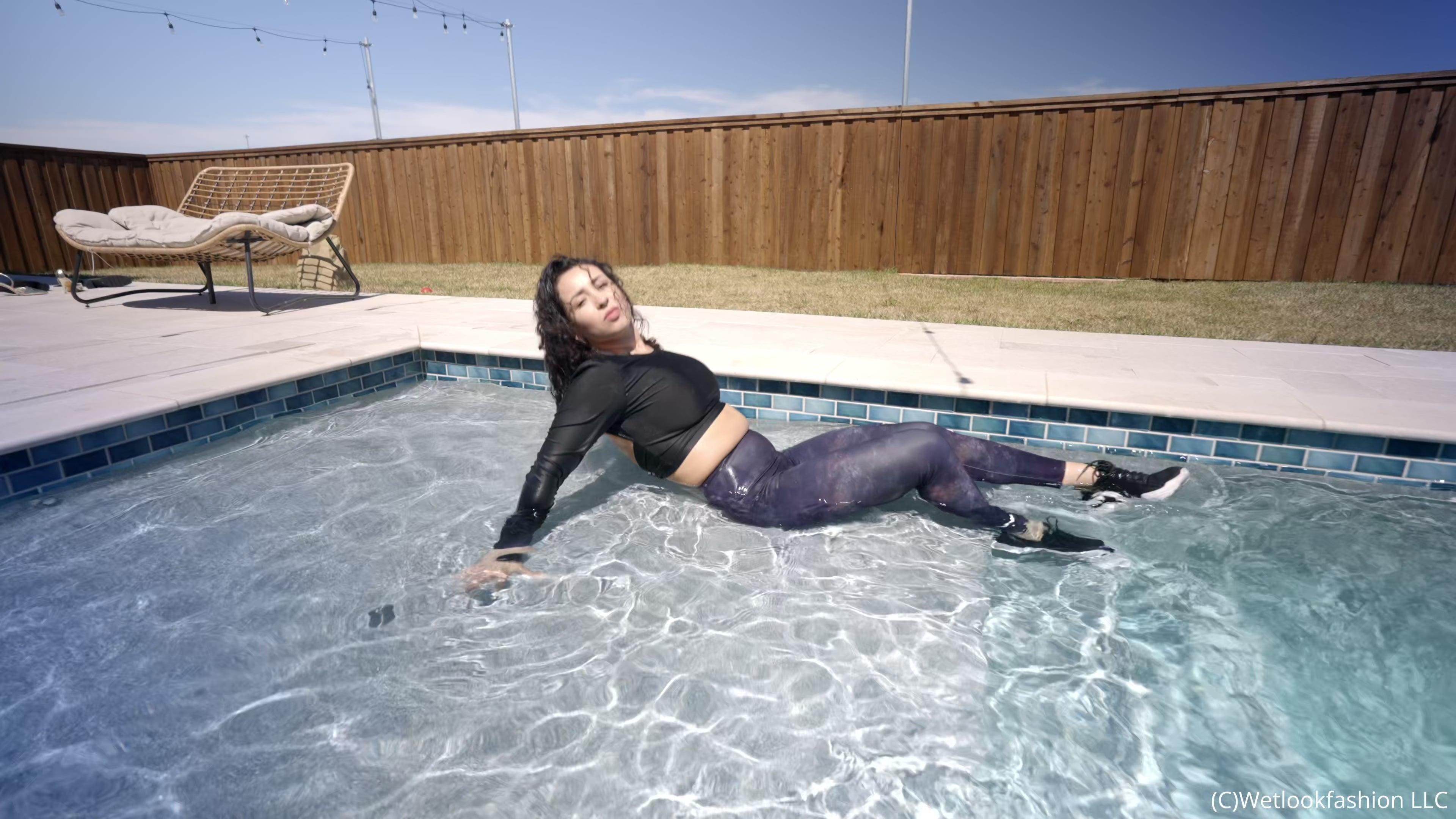 Gina Goes for a Swim in Leggings, a Shiny Top and Sneakers