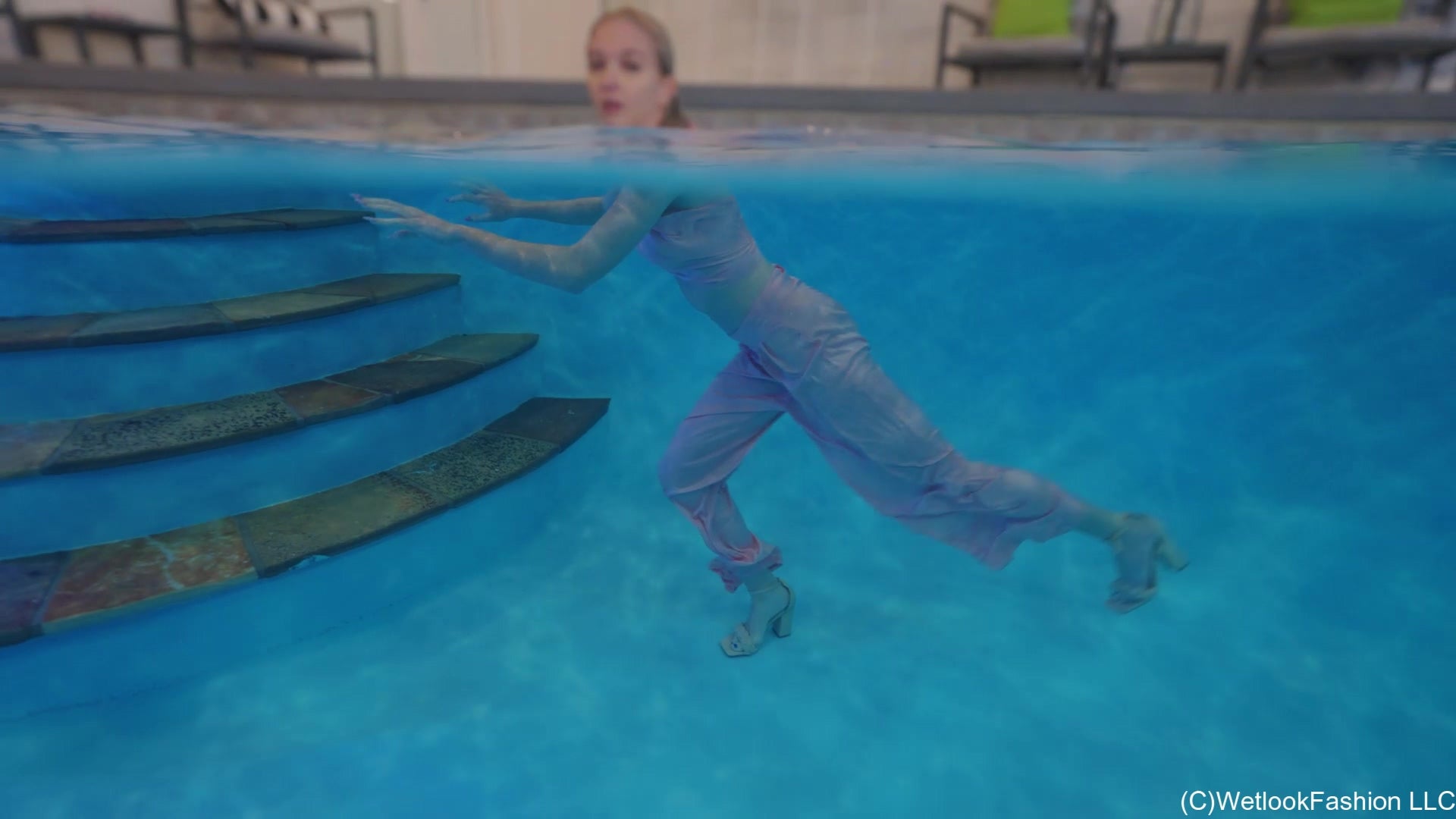 Hannah wears a Satin Set in the Pool