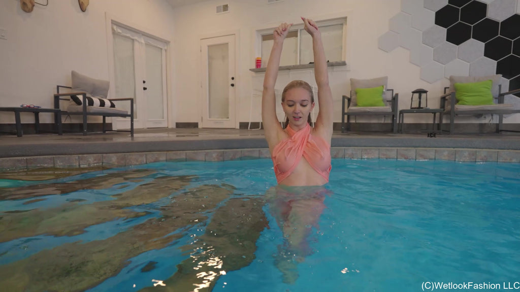 Hannah wears a Satin Set in the Pool