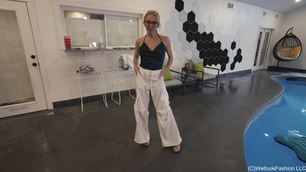 Hannah Swims in Fancy White Pants and Green Top