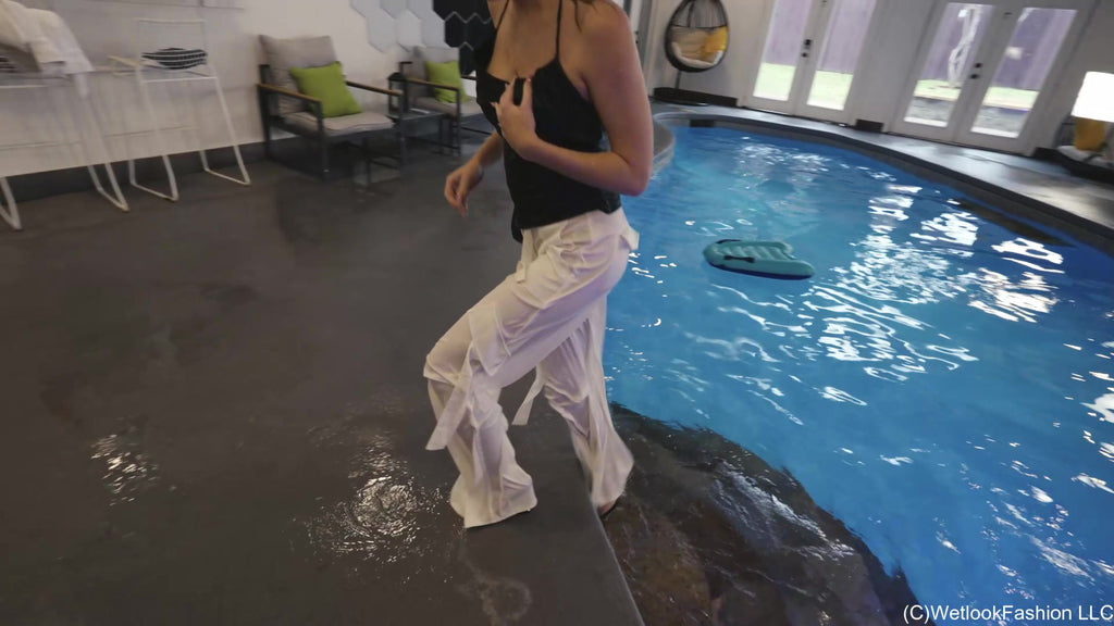 Hannah Swims in Fancy White Pants and Green Top
