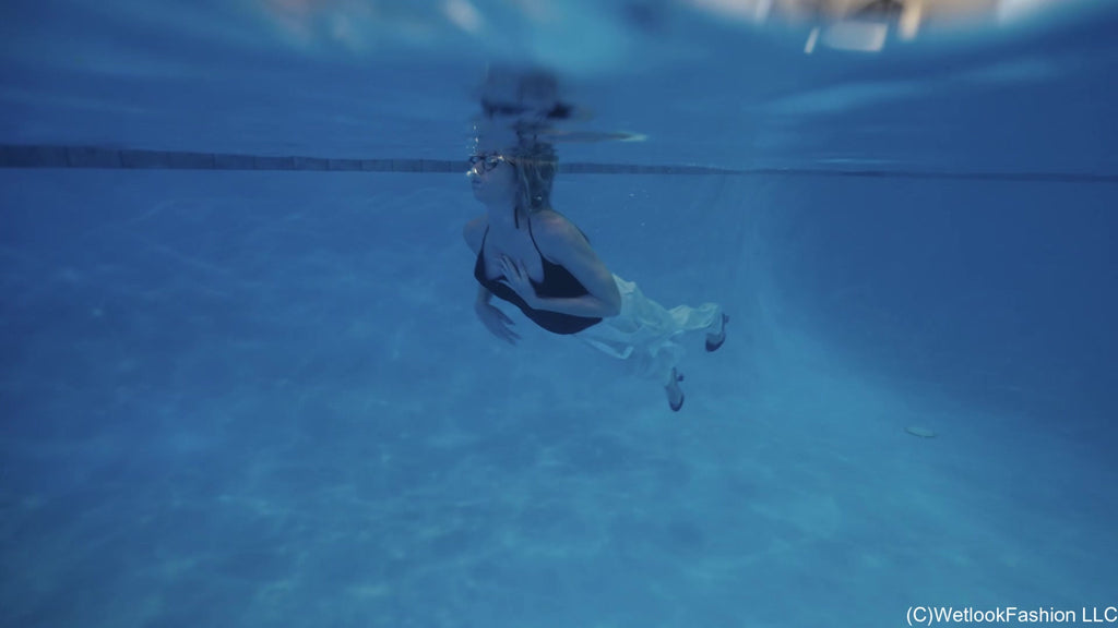 Hannah Swims in Fancy White Pants and Green Top