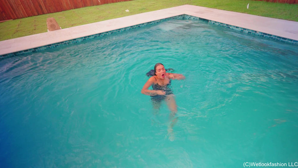 Iris Falls in the Pool Wearing Mini Dress