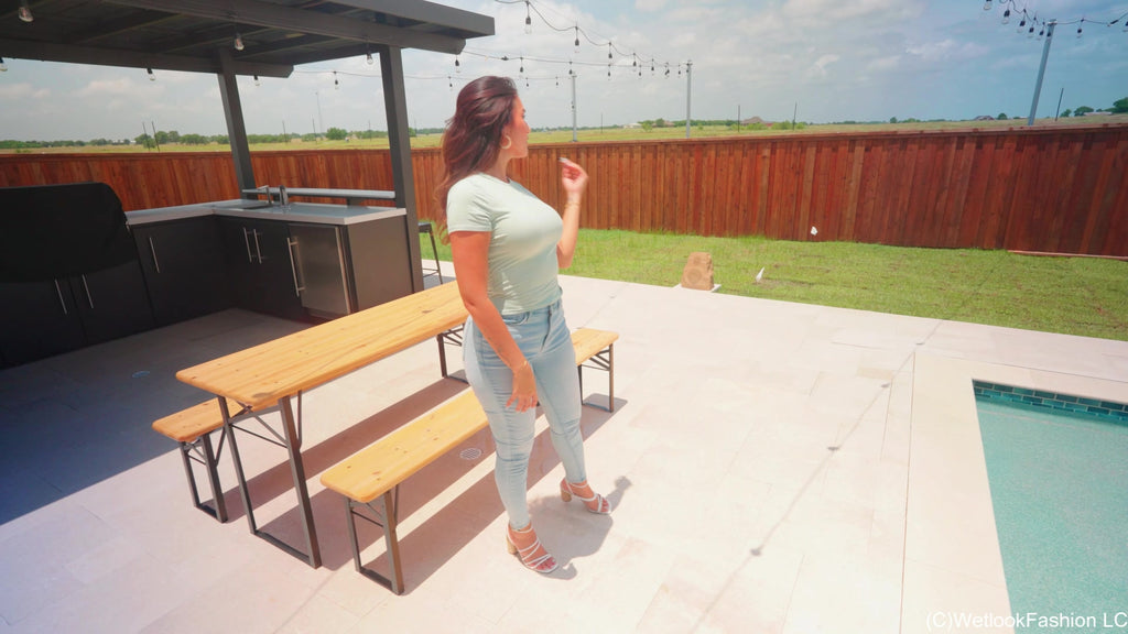 Iris Swims in Tight Jeans and T-Shirt