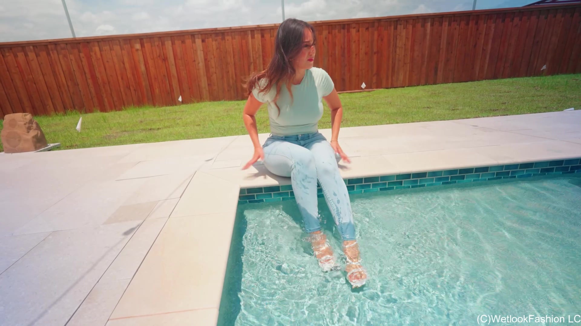 Iris Swims in Tight Jeans and T-Shirt