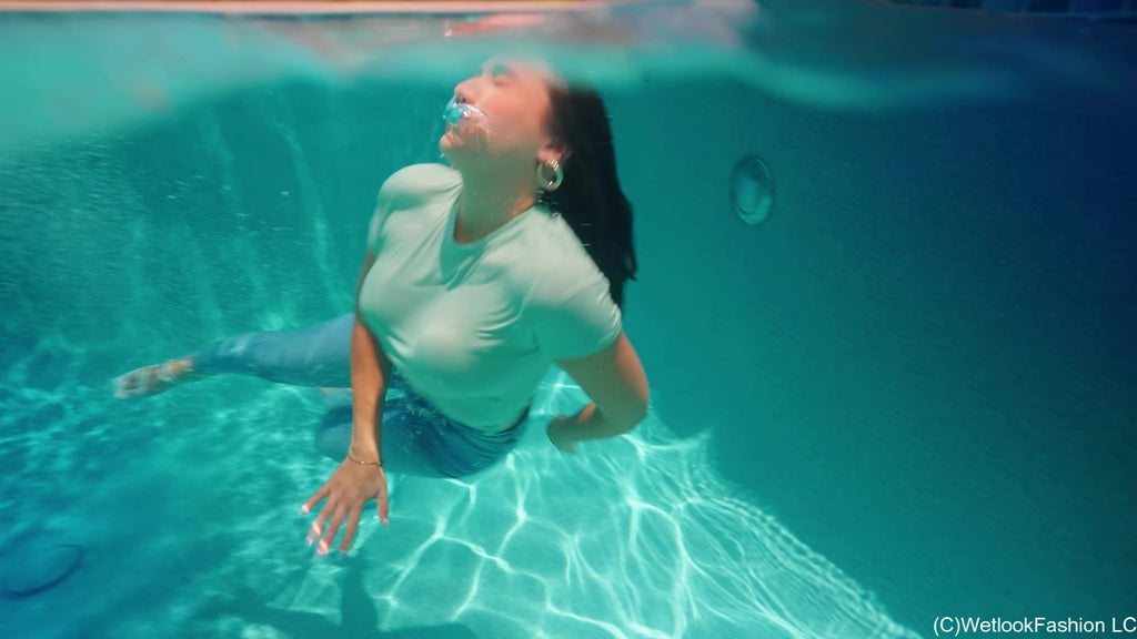Iris Swims in Tight Jeans and T-Shirt