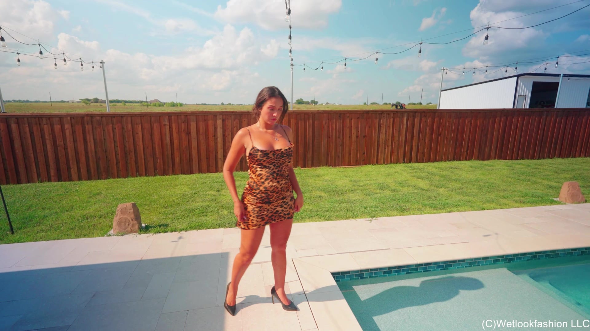 Iris Goes for a Swim in a Hot Leopard Minidress