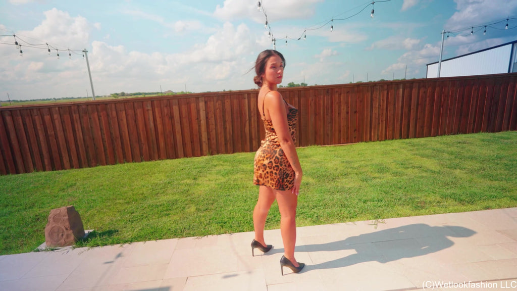 Iris Goes for a Swim in a Hot Leopard Minidress