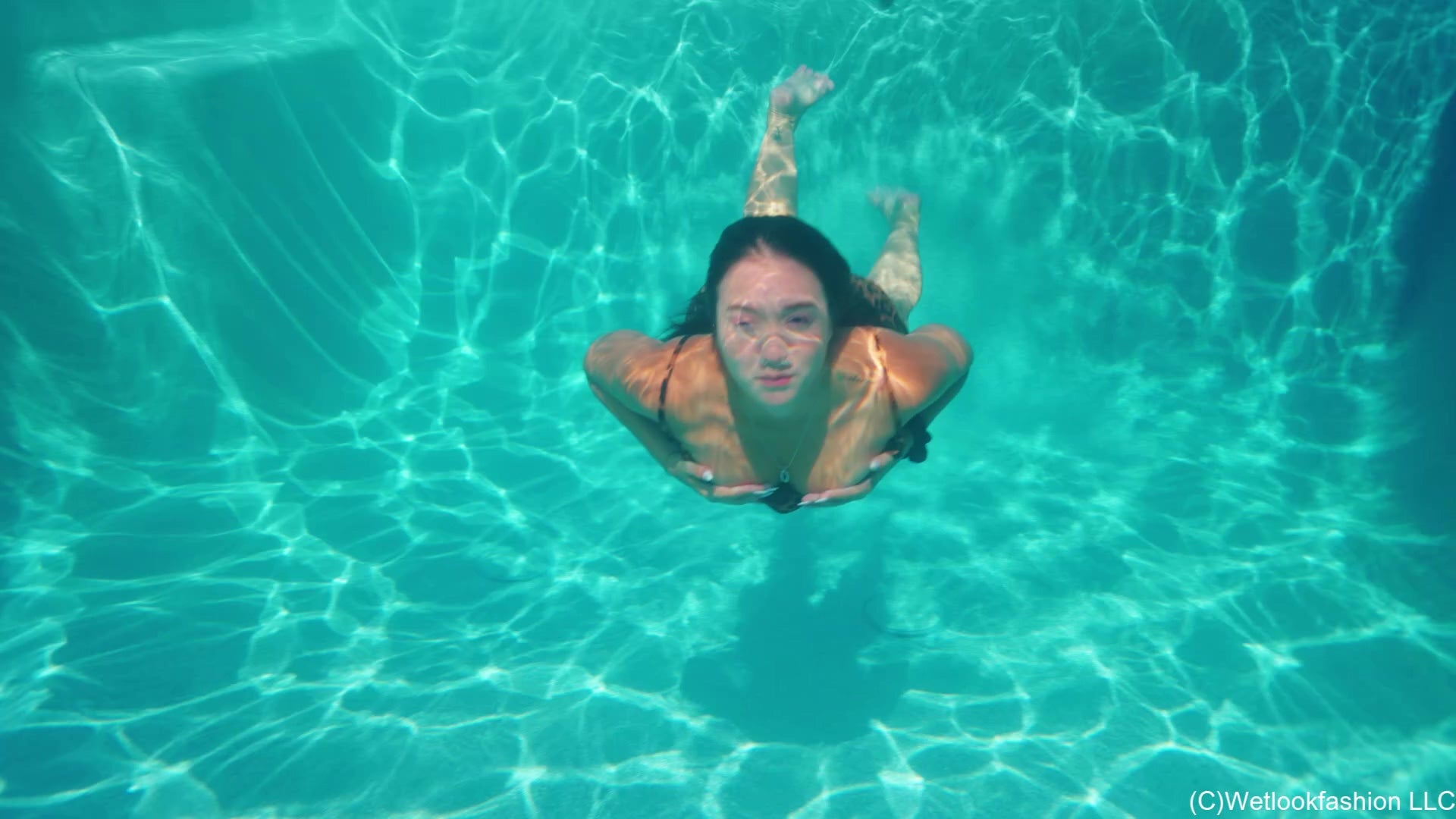 Iris Goes for a Swim in a Hot Leopard Minidress