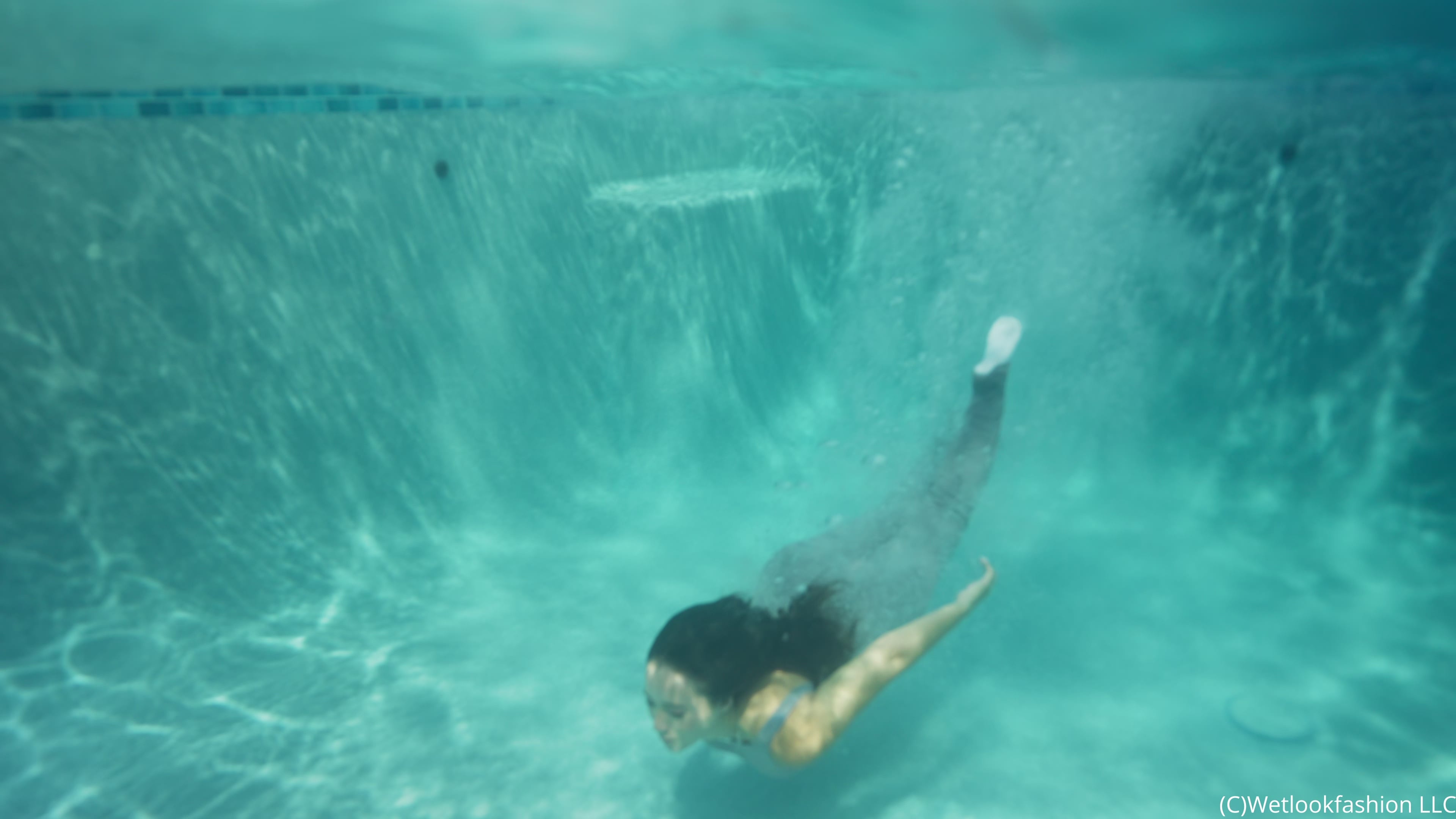 Iris Soaks Her Sporty Jumpsuit in the Rain and in the Pool
