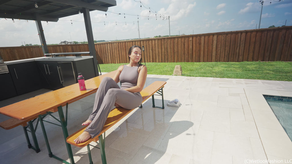 Iris Soaks Her Sporty Jumpsuit in the Rain and in the Pool
