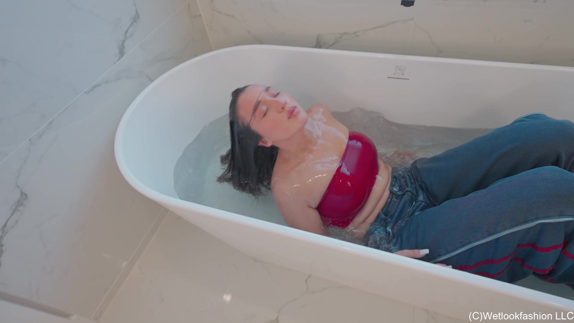 Iris takes a Bath in Jeans and Boots