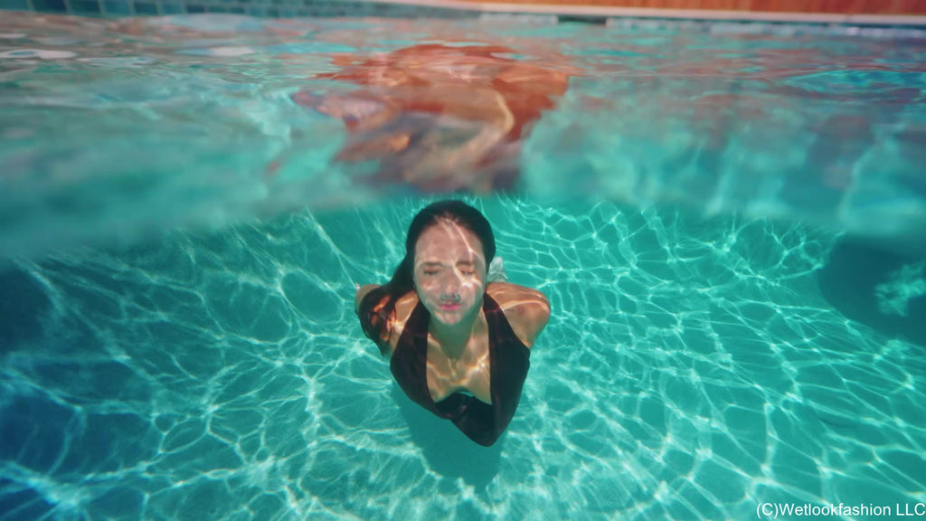 Iris Enjoys the Pool in Cargos and A Backless Top