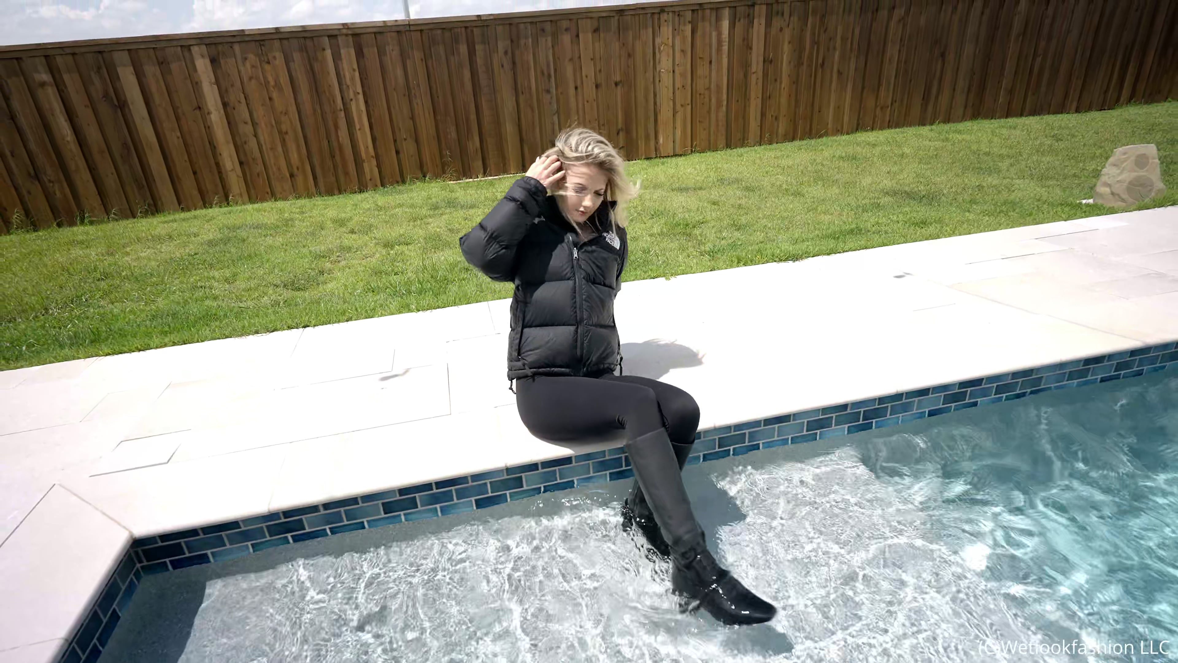 Izabella Goes for a Swim in a Jumpsuit, Jacket and Boots