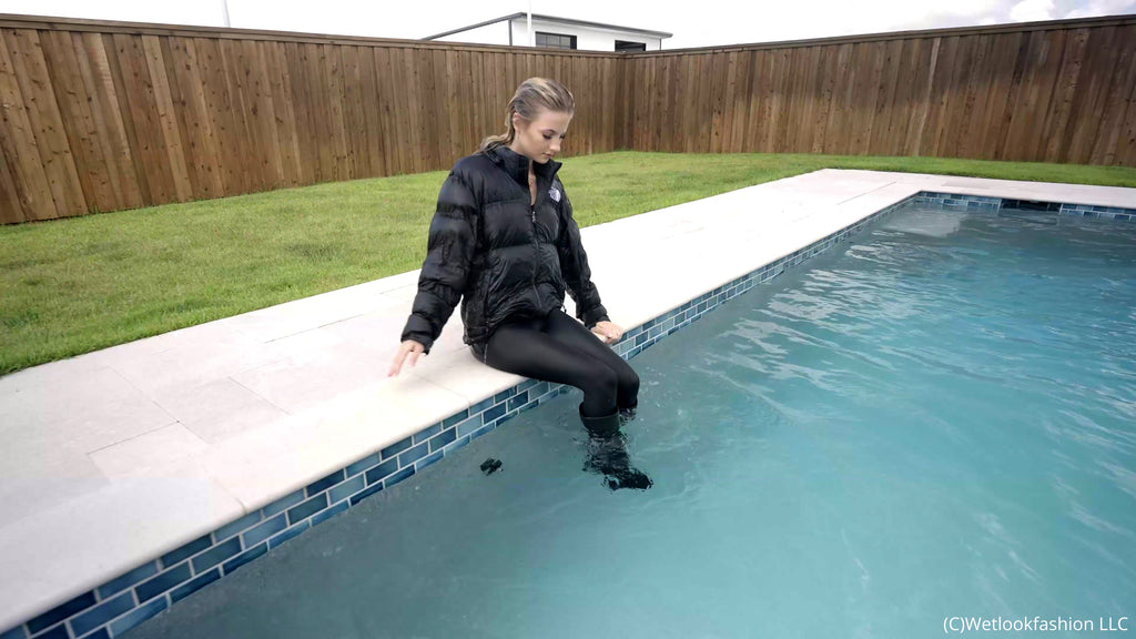 Izabella Goes for a Swim in a Jumpsuit, Jacket and Boots