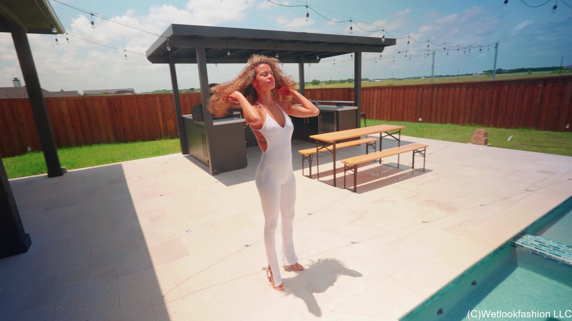 Jasmine Gets Wet in a White Jumpsuit and Heels