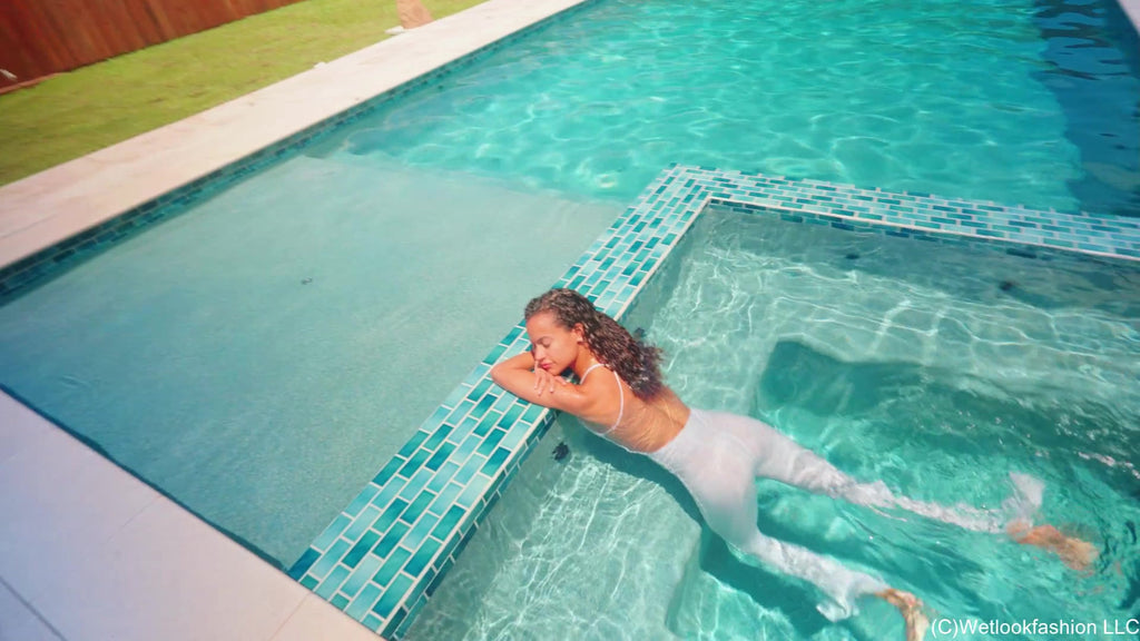 Jasmine Gets Wet in a White Jumpsuit and Heels