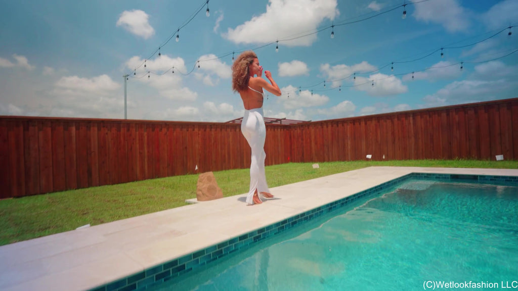 Jasmine Gets Wet in a White Jumpsuit and Heels